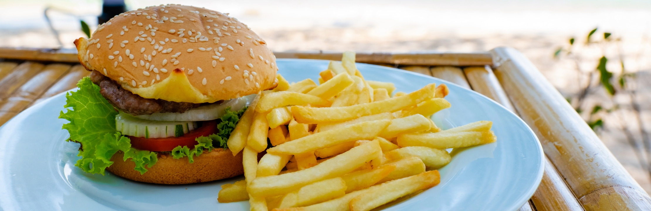 Burger and fries on the beach
